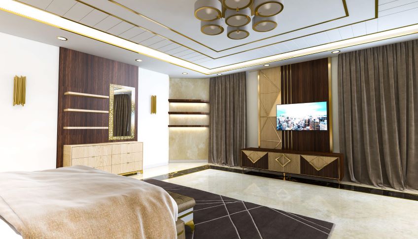 Luxury white and gold bedroom with a TV on the wall. Design by Whyte Concepts
